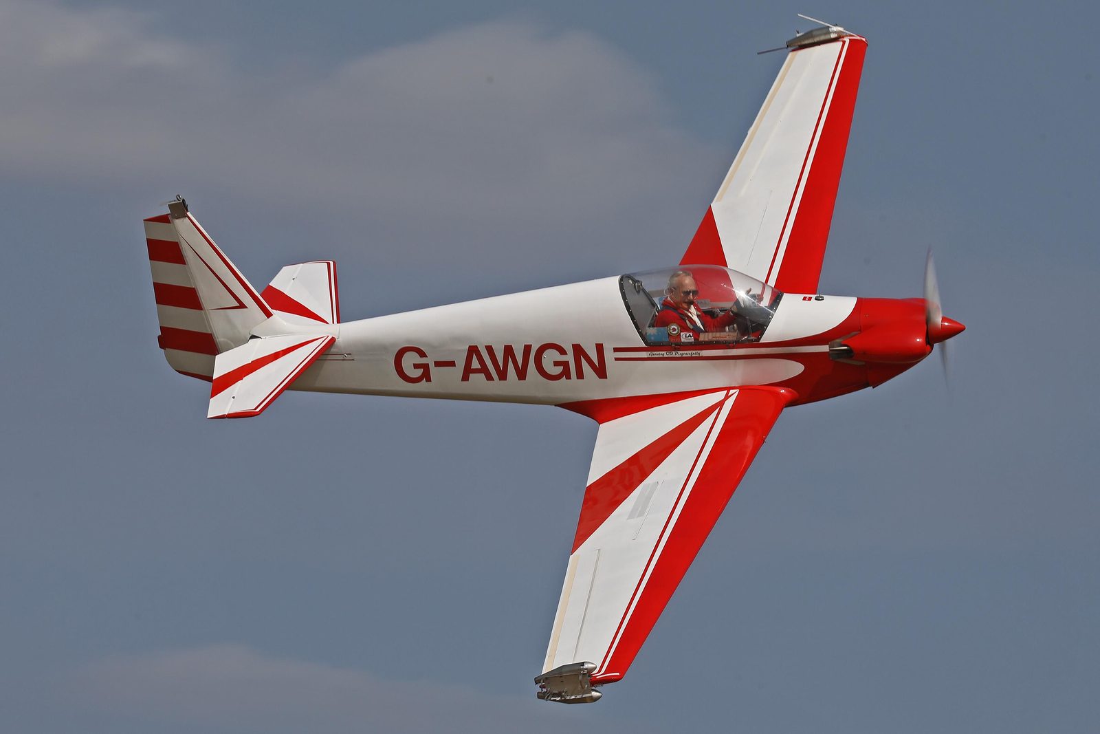 G-AWGN in flight, red and white wing