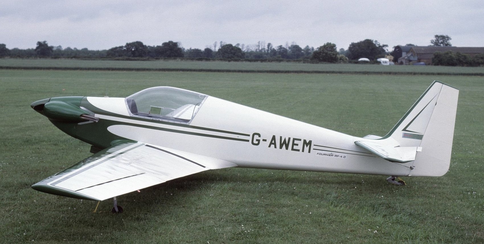 G-AWEM, green and white, on the grass