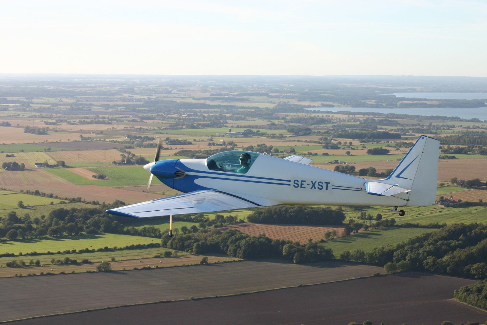 SE-XST · ex G-AVNX, air-to-air over Sweden · photo: Jörgen Åstrand