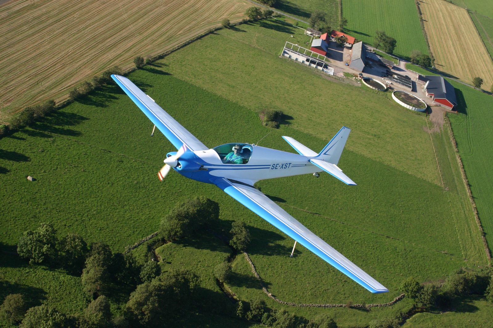 SE-XST · ex G-AVNX, air-to-air over Sweden · photo: Jörgen Åstrand