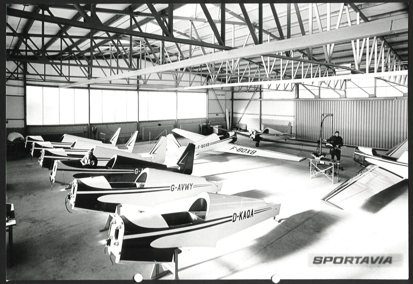 Historic black and white photo of the Sportavia factory, with G-AVWY, D-KAQA and F-BOXB
