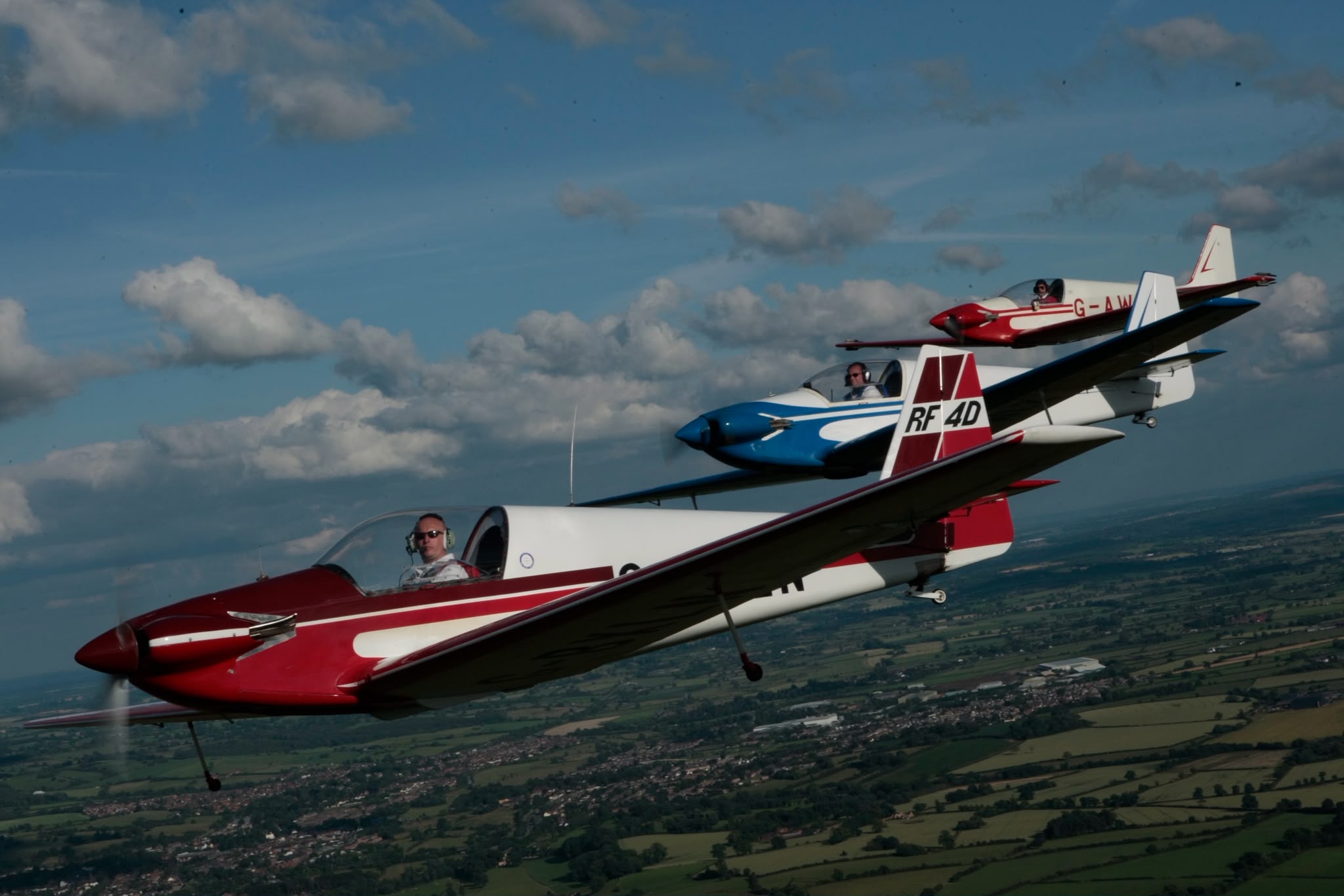 Three RF4Ds in formation, one tail marked RF4D
