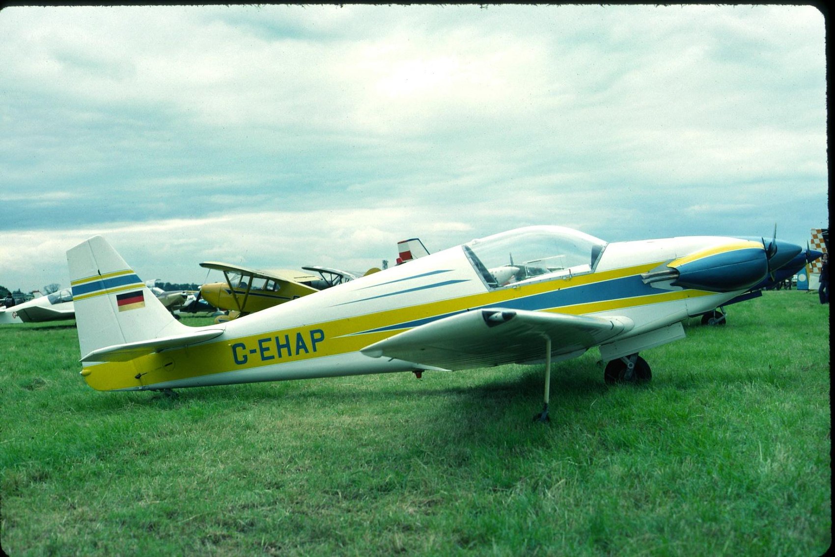 Fournier RF7 G-EHAP at Leicester, 1980, white with red and blue stripes