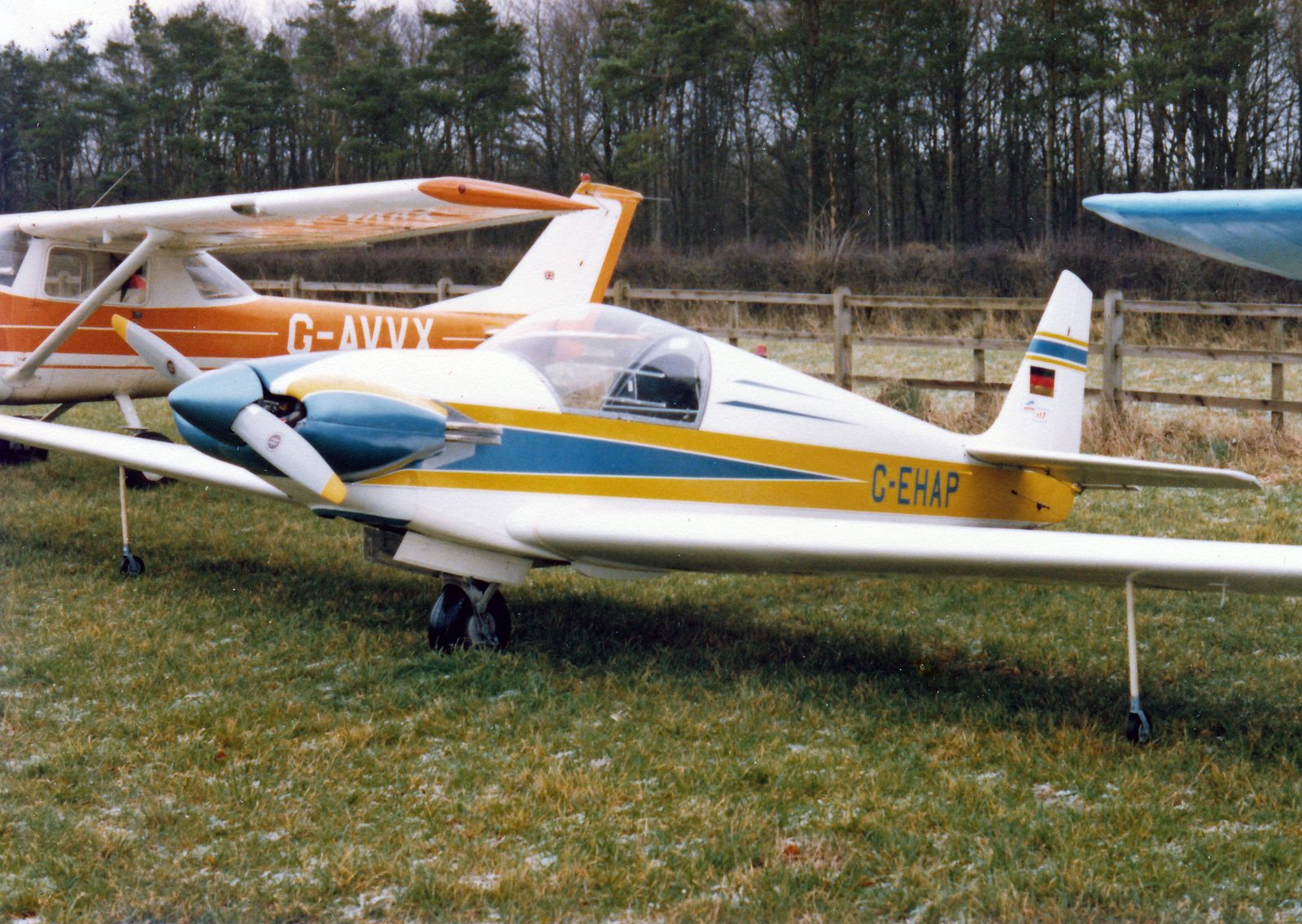 Fournier RF7 G-EHAP at Compton Abbas, blue and yellow scheme