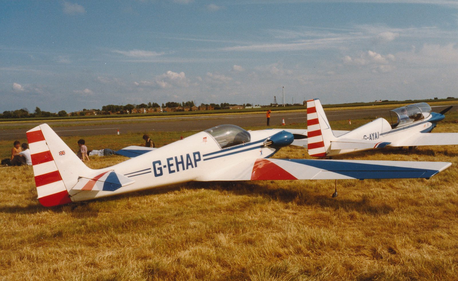 Fournier RF7 G-EHAP at Cranfield, parked beside RF5 G-AYAI