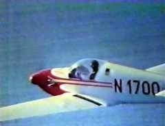 Close-up of N1700 in flight near the English coast