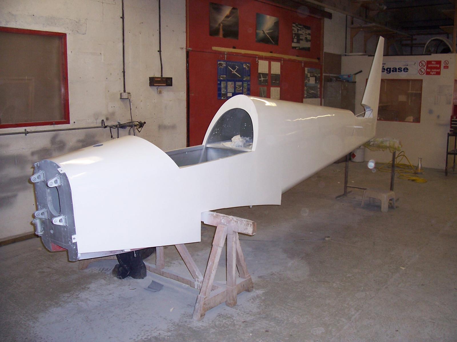 G-AWLZ fuselage in bare white GRP, no markings yet