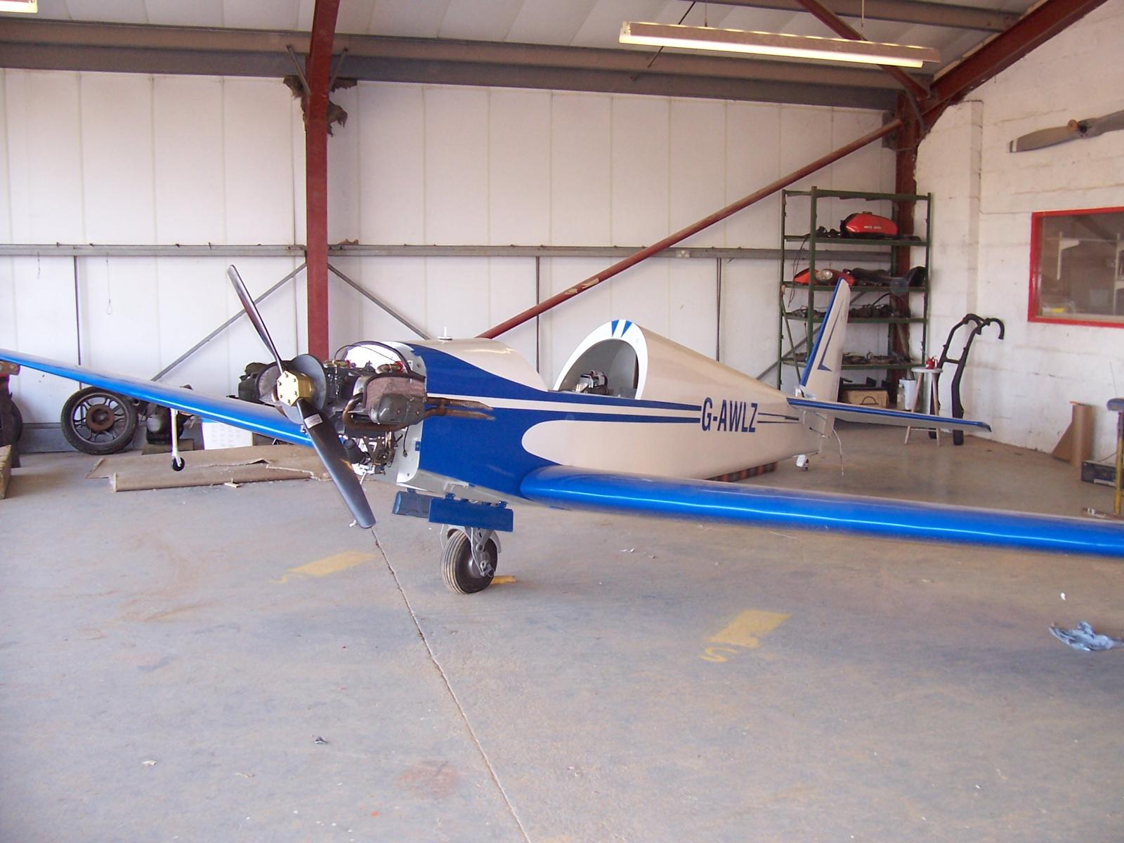 G-AWLZ with engine and propeller refitted in the hangar
