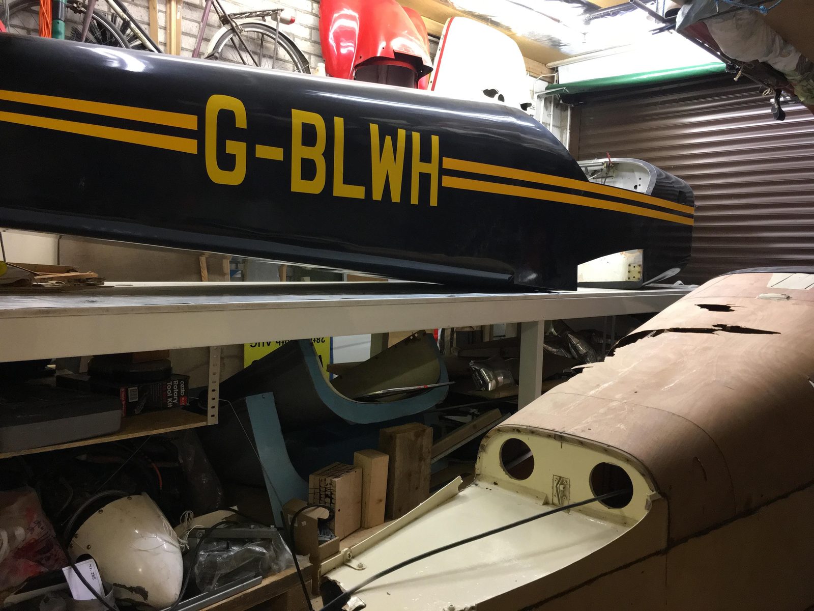 G-BLWH fuselage in the black and yellow scheme, during its rebuild